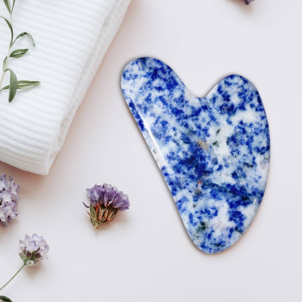 Quartz Gua Sha ansiktsmassasje i rosenkvarts