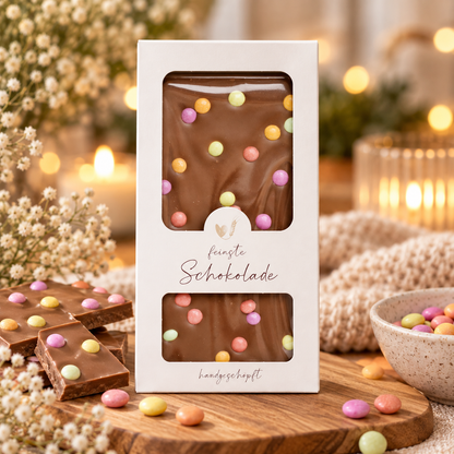 Melkesjokolade med fargerike sjokoladelinser